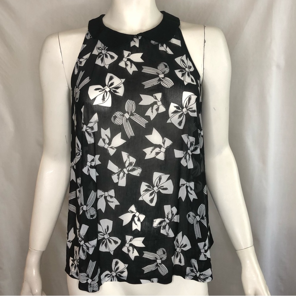 Woman’s sheer black top with white bows all over Peter Pan collar size large